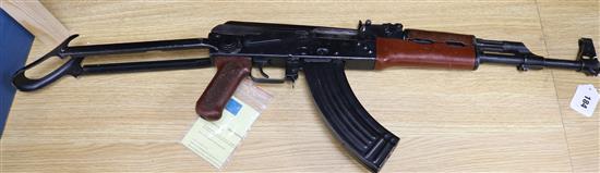 An AK 47 machine gun with deactivation certificate